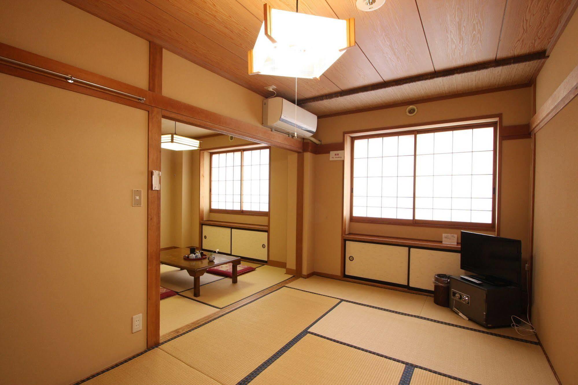 Hotel Kawahiro à Nozawaonsen Extérieur photo